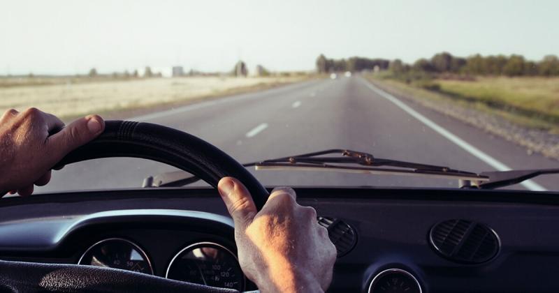 driver-behind-wheel-ways-to-improve-fuel-efficiency-fb-og