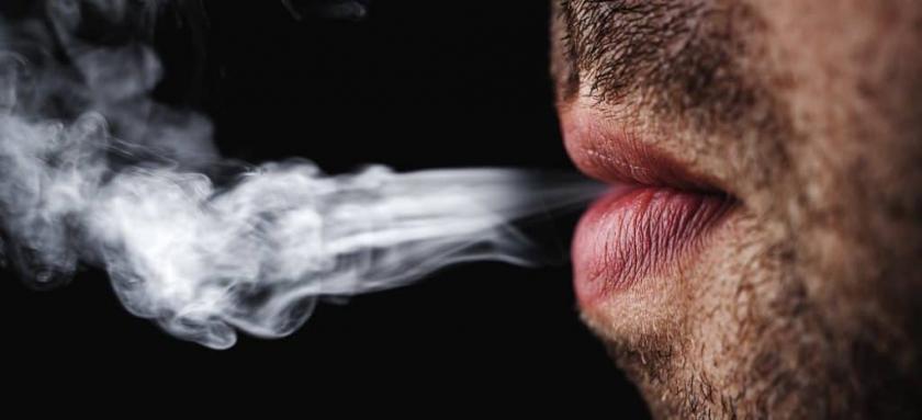 man-smoking-cigarette-1024x468