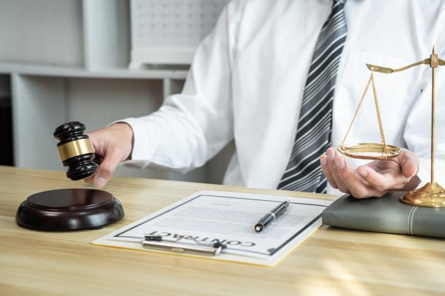 male-lawyer-or-jurist-working-with-litigation-cont-2022-02-10-05-11-19-utc