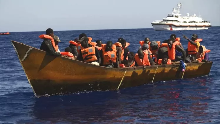 Migranți