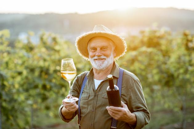 senior-winemaker-tasting-wine-on-the-vineyard-2021-09-27-16-31-55-utc