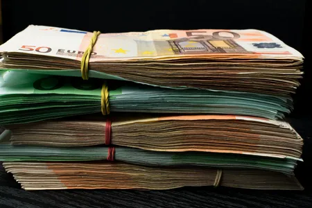 103847859-cash-money-euro-bills-euro-currency-money-euro-money-bank-for-your-budget-to-investment