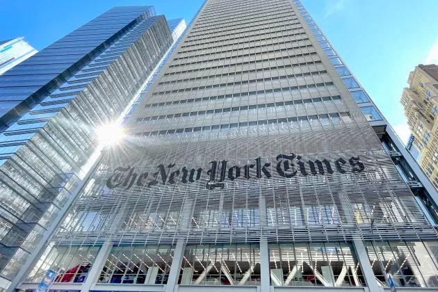 NYT-HQ-facade-sun-flare-GettyImages-1865239378-2400x1600-1