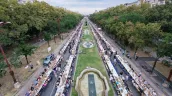 /FOTO/ Capitala României a intrat în Cartea Recordurilor: 20.000 de oameni s-au așezat la cea mai lungă masă din lume