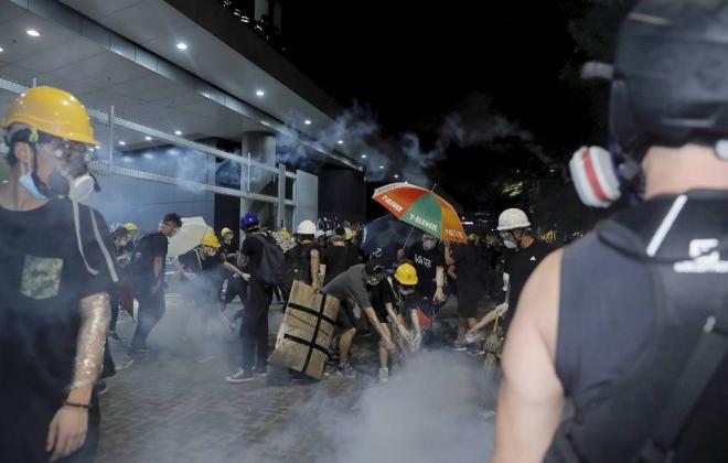 © AP Photo/Kin Cheung
