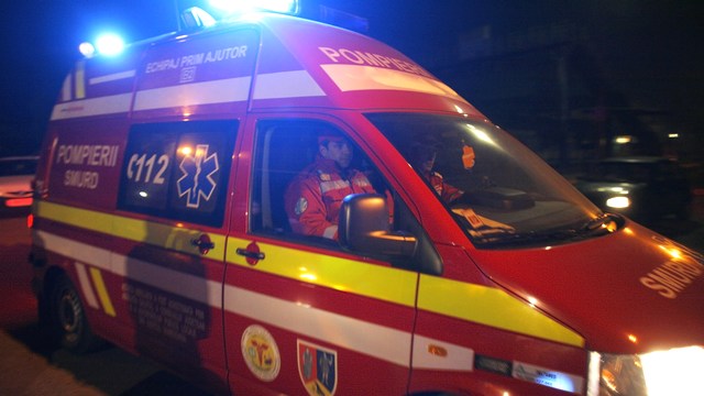 An ambulance leaves the coal mine area where a mining accident occurred in Petrila, 240 km (149 miles) west of Bucharest early November 16, 2008. At least 12 miners were killed and nine injured in two explosions in a coal mine in southwest Romania on Satu