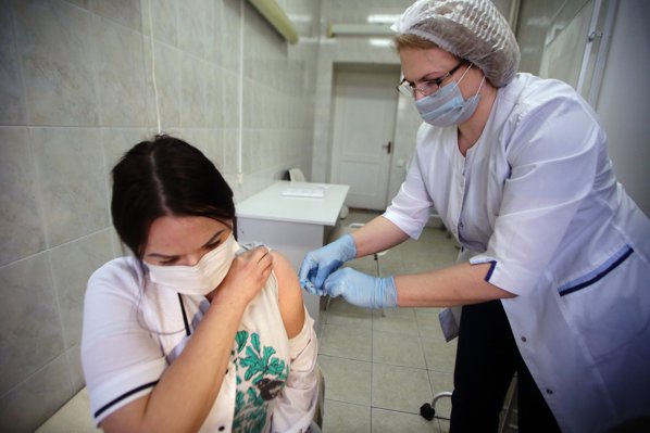 the-beginning-of-vaccination-against-coronavirus-infection-covid-19-of-healthcare-workers-the-first-250-doses-of-the-vaccine-were-delivered-to-the-semashko-city-hospital-no-1-genre-photography