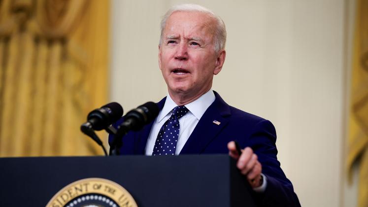 U.S. President Joe Biden delivers remarks on Russia in the East Room at the White House in Washington, U.S., April 15, 2021. REUTERS/Tom Brenner