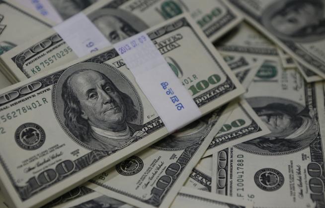 u-s-one-hundred-dollar-bills-are-seen-in-this-photo-illustration-at-a-bank-in-seoul