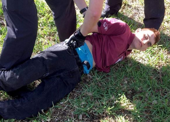49394ae000000578-5392559-nicolas_cruz_19_was_arrested_after_he_stormed_marjory_stoneman_d-m-1_1518657645987