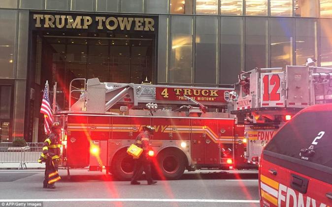 4aee40de00000578-5590101-the_massive_response_at_trump_tower_called_for_well_over_140_fir-a-93_1523149907004