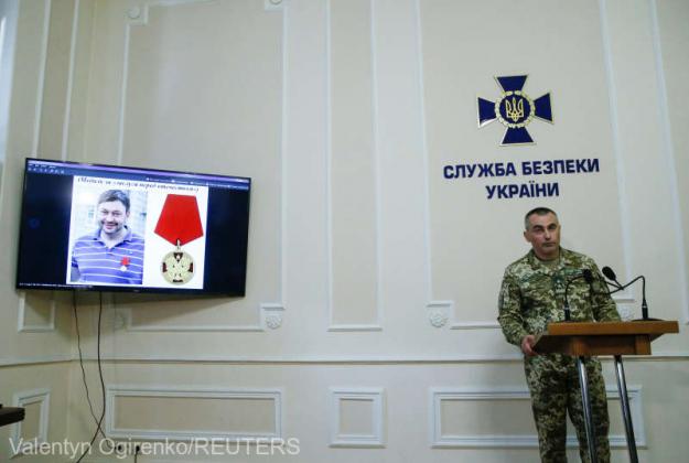 A portrait of the director of Kiev's office of Russian state news agency RIA Novosti Kirill Vyshinsky is seen on a monitor during a news briefing at the headquarter of the Ukrainian State Security Service in Kiev, Ukraine May 15, 2018. REUTERS/Valentyn Og