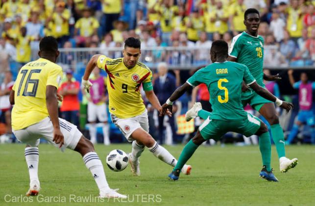 Soccer Football - World Cup - Group H - Senegal vs Colombia - Samara Arena, Samara, Russia - June 28, 2018   Colombia's Radamel Falcao in action with Senegal's Idrissa Gueye    REUTERS/Carlos Garcia Rawlins