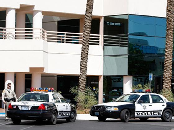 LAS VEGAS - JULY 28: Las Vegas Metropolitan Police Dept. cars are parked outside Global Cardiovascular Associates Inc., the medical office of Michael Jackson's personal physician Dr. Conrad Murray, as Las Vegas and Los Angeles police and federal Drug Enfo