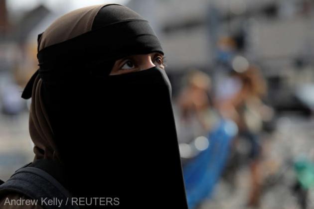 Sabina, 21, member of the group Kvinder I Dialog and wearer of the Islamic clothing the niqab, speaks to media to promote their group's protest against the Danish face veil ban which will come into effect August 1, 2018, in Copenhagen, Denmark, July 31, 2