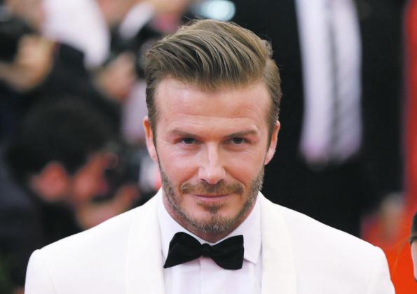 Soccer star David Beckham arrives at the Metropolitan Museum of Art Costume Institute Gala Benefit celebrating the opening of "Charles James: Beyond Fashion" in Upper Manhattan, New York, May 5, 2014.  REUTERS/Lucas Jackson (UNITED STATES  - Tags: ENTERTA