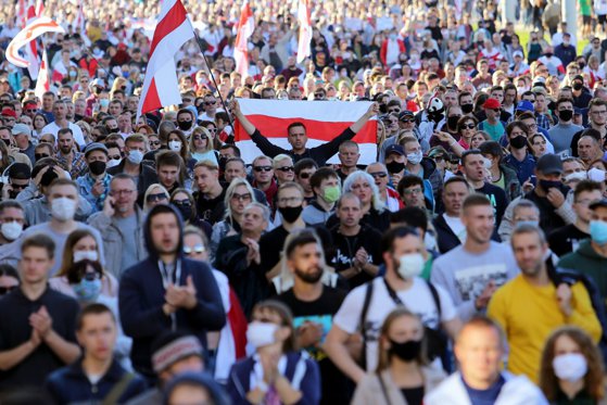 People march during a demonstration called by opposition movement for an end to the regime of the authoritarian leader in Minsk on September 20, 2020        Belarus President Alexander Lukashenko, who has ruled the ex-Soviet state for 26 years, claimed to