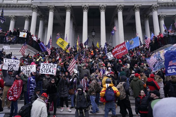 Protesters gather on the second day of pro-Trump events fueled by President Donald Trump's continued claims of election fraud in an to overturn the results before Congress finalizes them in a joint session of the 117th Congress on Wednesday, Jan. 6, 2021