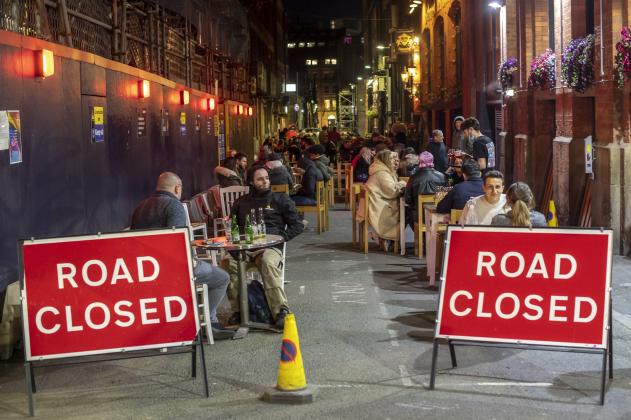 MANCHESTER, ENGLAND - APRIL 12: Road closed signs are seen outside a bar on Canal Street on April 12, 2021 in Manchester, England. England has taken a significant step in easing its lockdown restrictions, with non-essential retail, beauty services, gyms a