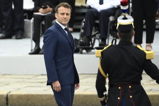 French President Emmanuel Macron reviews French troops during the annual Bastille Day military parade on the Champs-Elysees avenue in Paris on July 14, 2021.,Image: 621424891, License: Rights-managed, Restrictions: , Model Release: no, Credit line: Profim