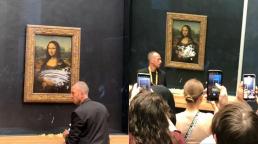 В Лувре мужчина измазал тортом защитное стекло картины "Мона Лиза" Леонардо Да Винчи