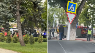 /VIDEO/ Cu benzina, în copac: Un bărbat a amenințat că își va da foc, lângă Parlament