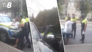 /VIDEO/ Scandal cu pumni și înjurături: O șoferiță a fost încătușată! Femeia și polițiștii au versiuni diferite